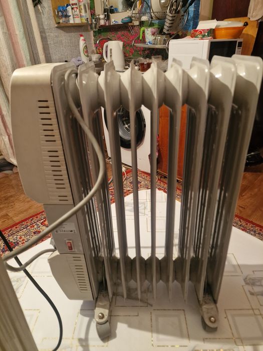 Масляный обогреватель