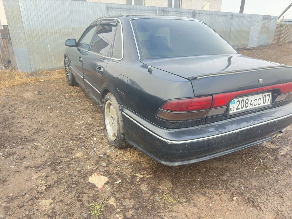 Митсубиси Сигма 900 мың