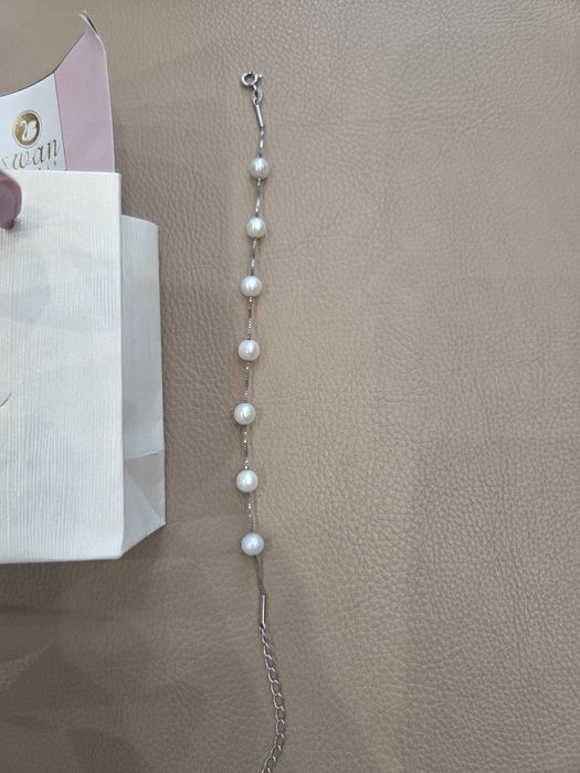 Сребърна гривна с перли