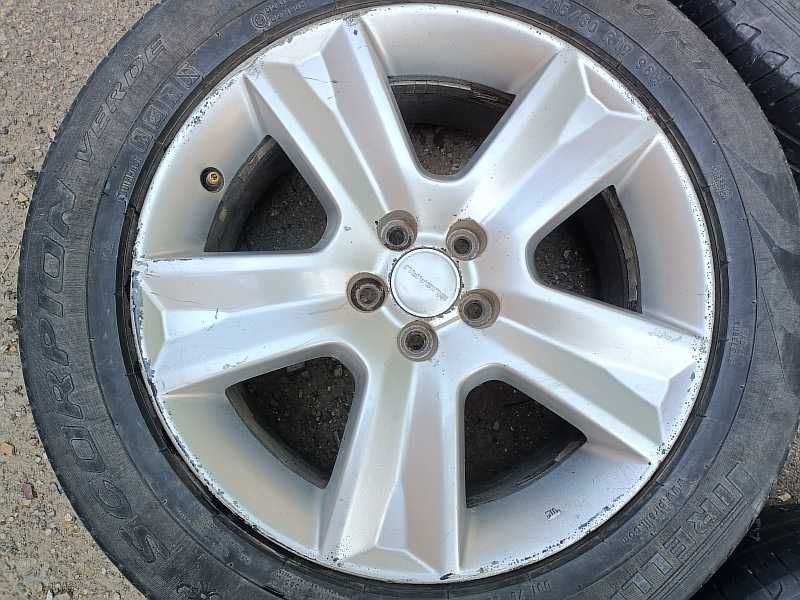 Продам оригинальные легкосплавные диски на Subaru
