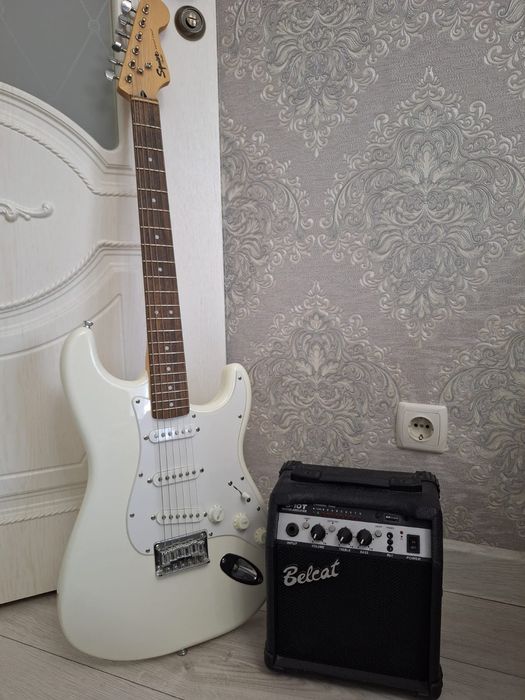 Гитара в наборе + струны в подарок!