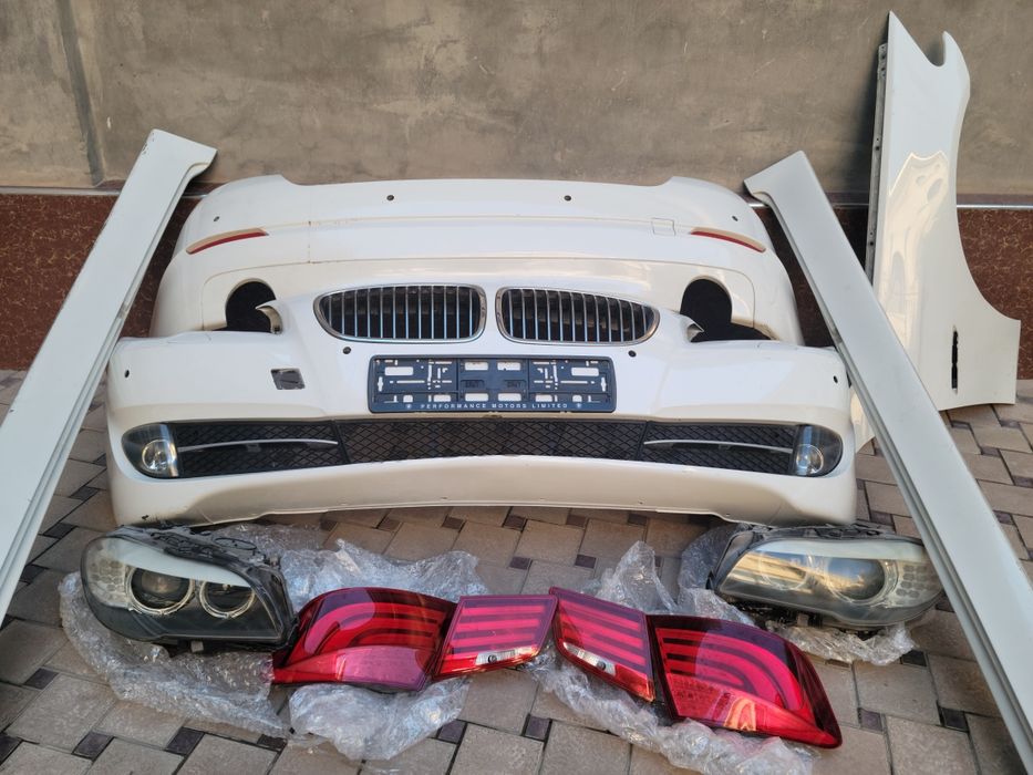 BMW F10 2011 родной бамферы пароги и фары