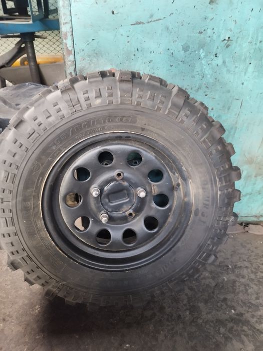 Vând janta tabla cu cauciuc Suzuki Jimny+ suport de prindere