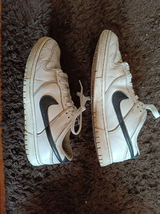 Nike Dunk Low black swoosh