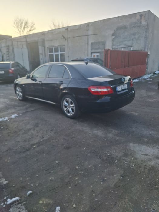 Mercedes-Benz E200 136cp
