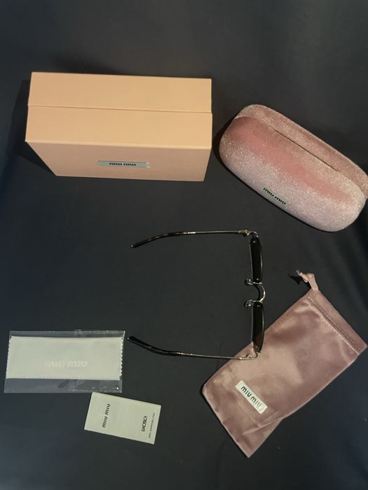 Ochelarii Miu Miu