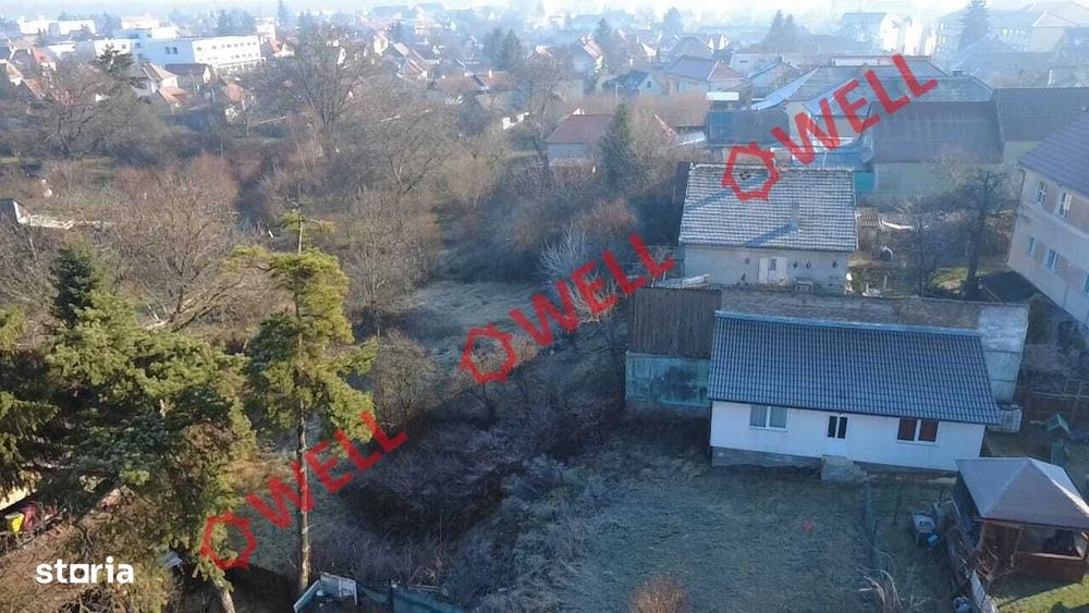 Casă din lemn de vânzare pe teren de 896 m²!
