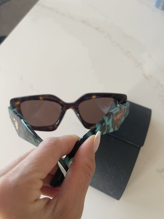 PRADA Temple tortoiseshell-effect sunglasses