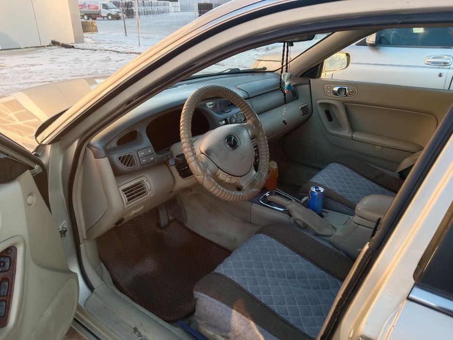 Мазда.  Милления