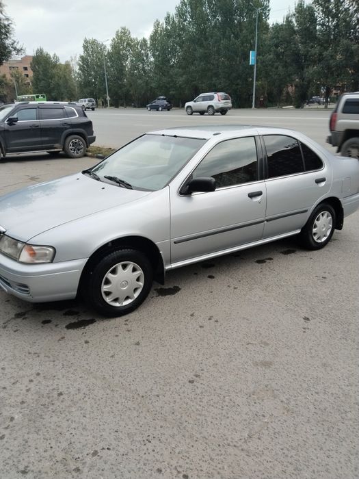 Продам автомобиль Ниссан Санни 1998 г.в.куплен. в салоне,один хозяин