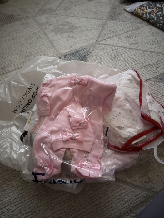 Одежда новорожденных