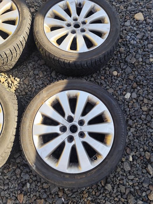 Set 4 jante aliaj 5X115 pentru Opel . Cu anvelope M+S 215/50R17.