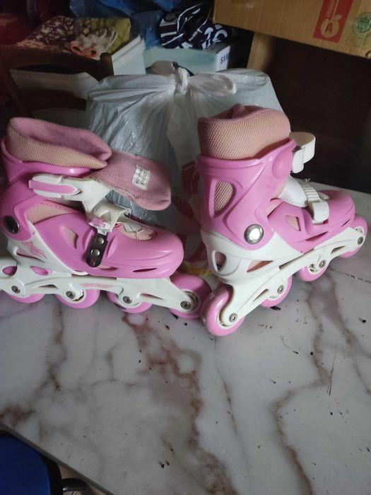 Роликовые коньки