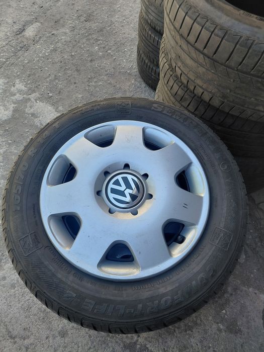 VW Polo  5×100-14" Жл.джанти с гуми+тасове