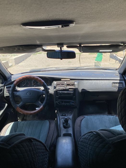 Tayota Carina E  Газ бензин