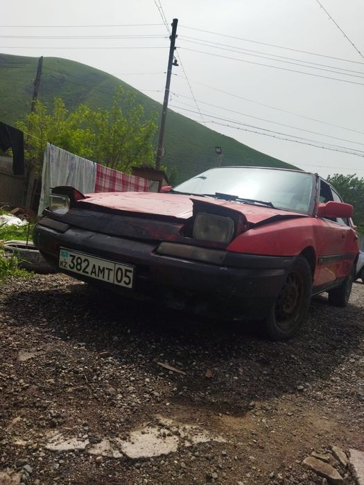Продам Мазду 323вроде