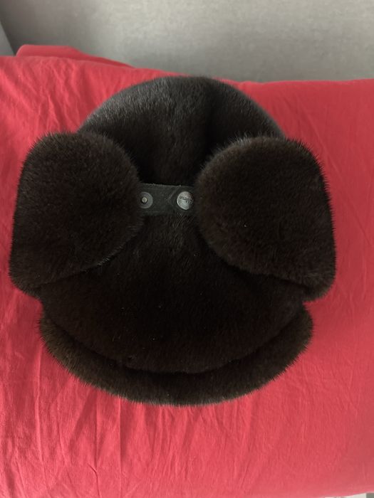 Продам шарку-ушанку в отличном состояний