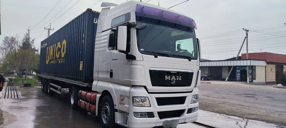 MAN TGX 18.440 + SCHMITZ Прицеп Сотилади