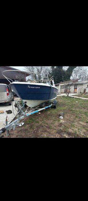 Barca cu motor -peridoc inclus