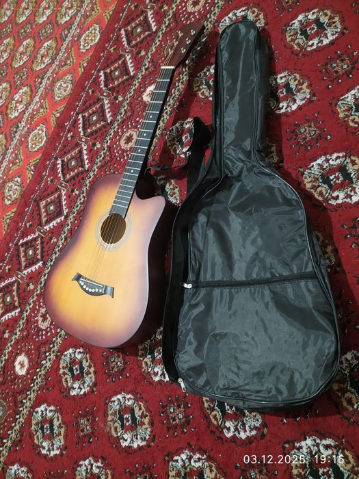 Гитара сотилоди тозо