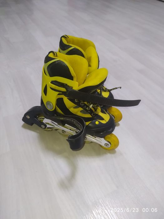 Роликовые коньки