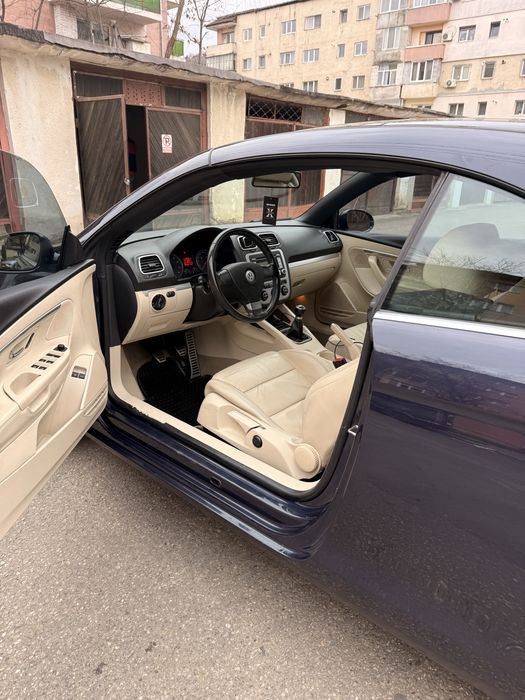 Vw Eos 1.4 benzina 122cp vand sau schimb cu Atv!!