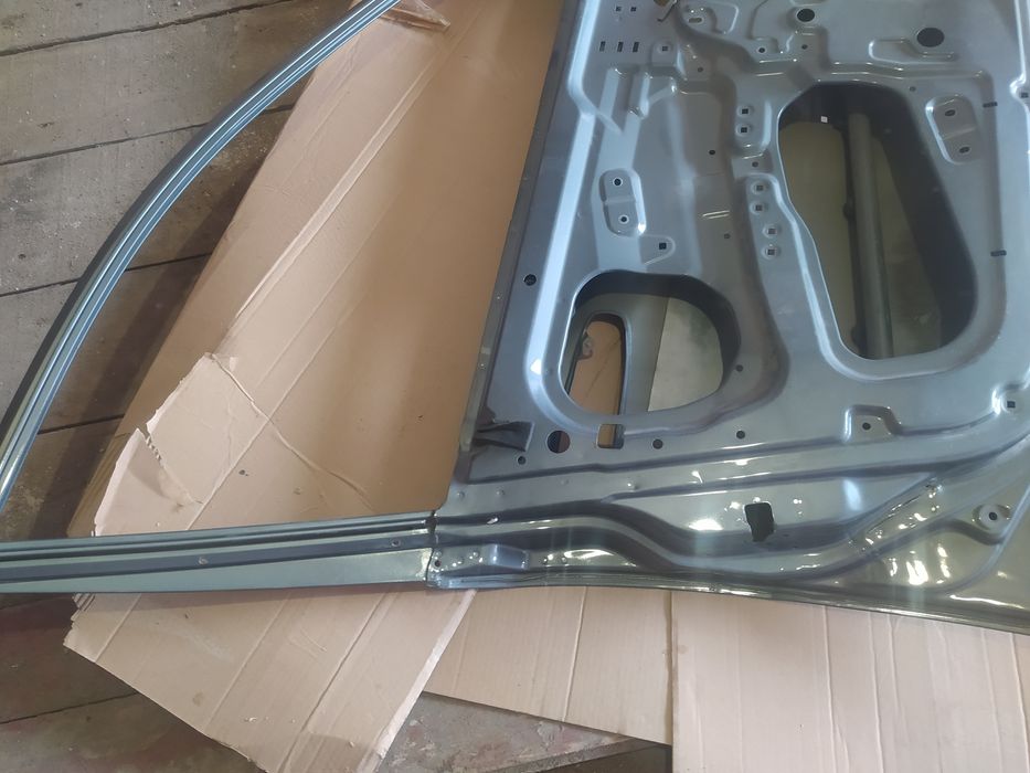 Передня левая дверь lacetti