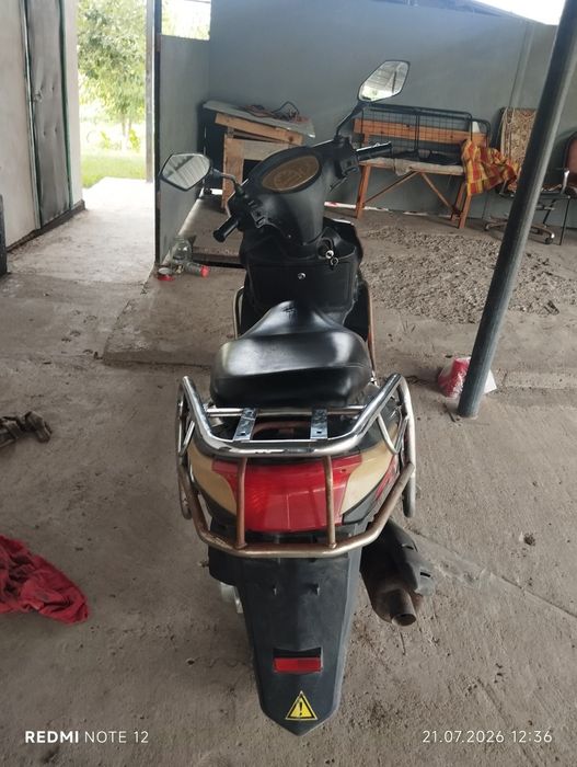 Скутер 125 кубов