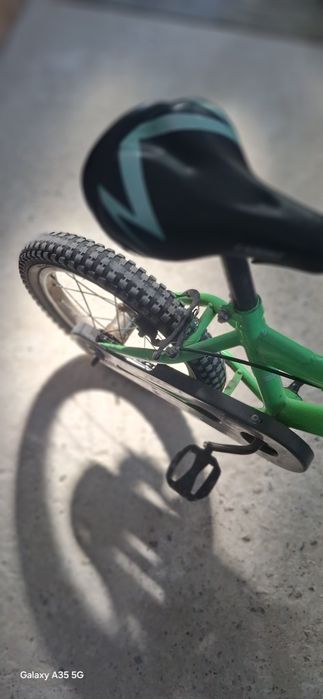 Vând bicicleta copii maxim 9 ani