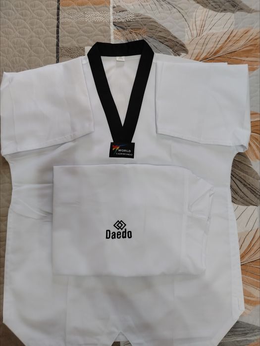 Продам новый добок( кимоно)