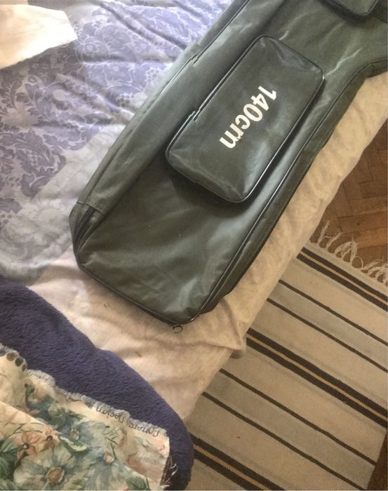 Корабче за внасяне на въдицити и захр. Двоен калъф за въдици с макари