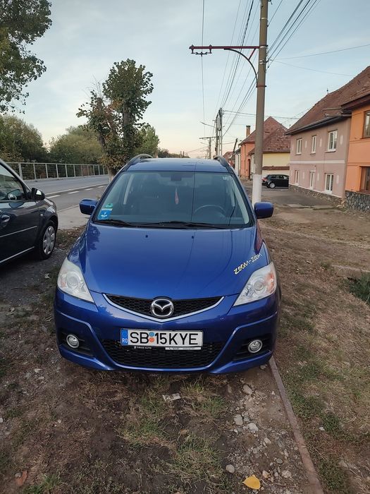 Mazda 5 (2008) • 2.0 Diesel (143 CP) • Anvelope Noi All Season Bridgestone • 7 locuri
