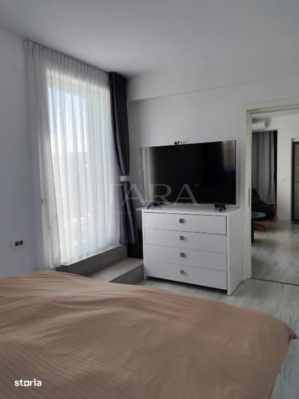 Apartament 2 camere, Chinteni – finisat, terasă 22 mp, parcare inclusă