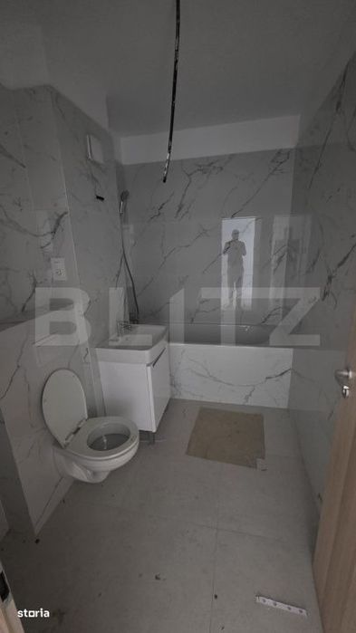 Apartament 2 camere, decomandat, etaj 3, parcare subterana inclusa