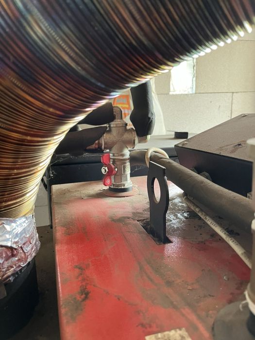 Комбиниран котел за пелети и дърва