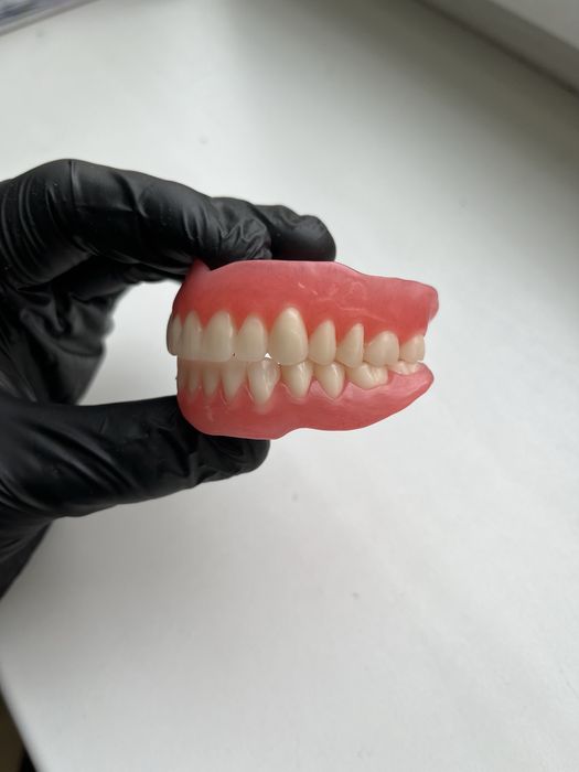 Зубной техник