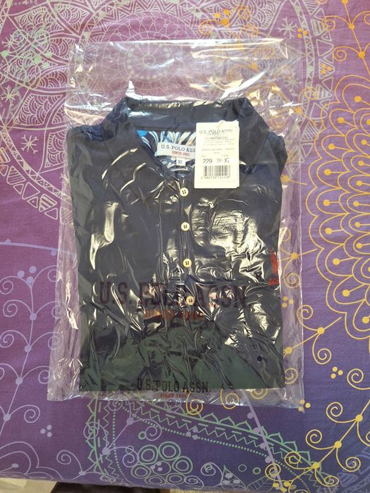 Tricou nou dama firma Polo Marimea XL pret 150lei.