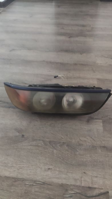 Фара   на BMW левая со стеклом