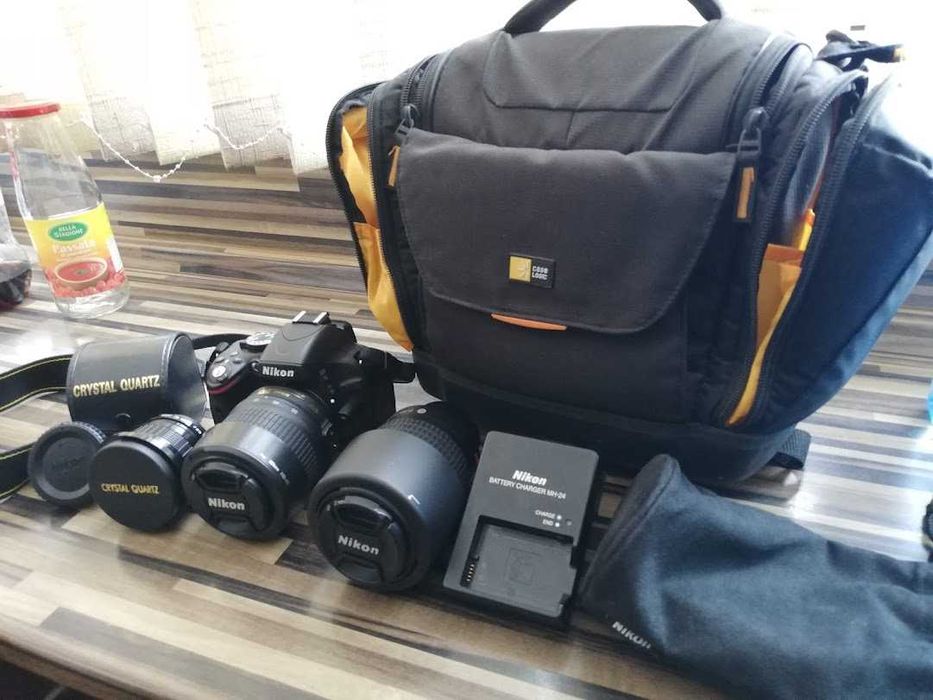 Продавам фотоапарат NIKON D5100 с пълен комплект обективи и аксесоари