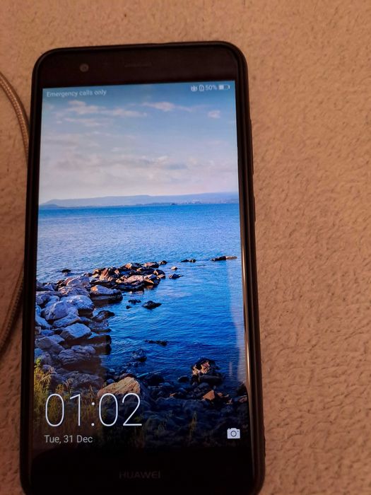 телефон huawei p10 lite .