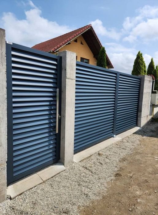 Executăm porți la comanda clientului din lamele executăm porți din șipcă metalică executăm porți din tablă decupată executăm porți din tablă cutată ex