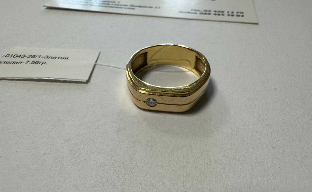Златен пръстен 7.56гр.18К с диамант+сертификат
