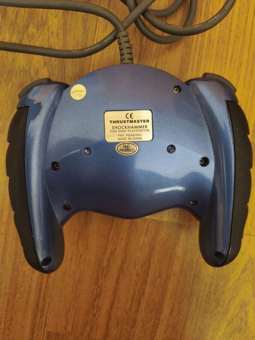 Controller Thrustmaster Shockhammer PS1 (compatibil și pe unele PS2)