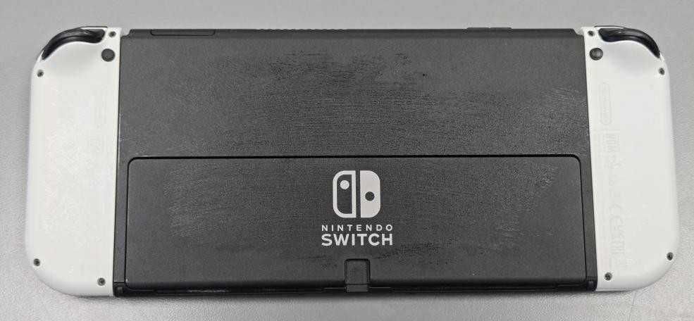 Nintendo Switch OLED (HEG-001) 64 ГБ, белые Joy-Con, с чехлом