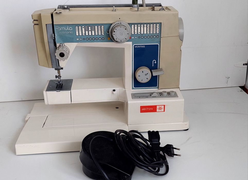 Masina. cusut  gritzne.  Ricaccar Graifar rotativ. Și singer 8280.