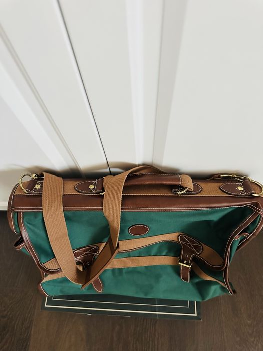 Geanta de voiaj /servieta / geamantan , mare din piele si impermeabila