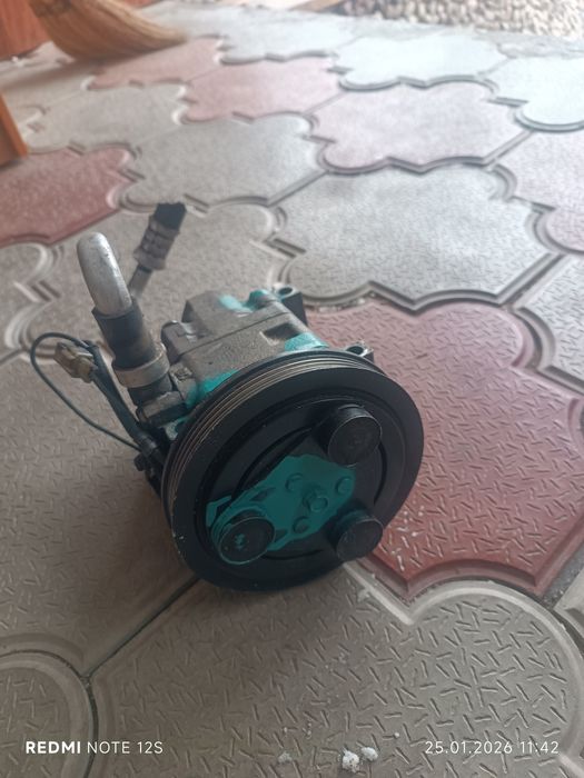 Компрессор кондиционера Мазда 323