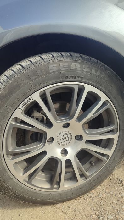 Диск с колесом для автомобиля