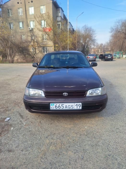 Продам тойоту карина е