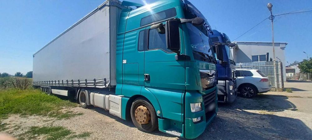 Ansamblu MAN TGX + Semiremorcă KRONE cu prelată la un Preţ PROMOŢIONAL